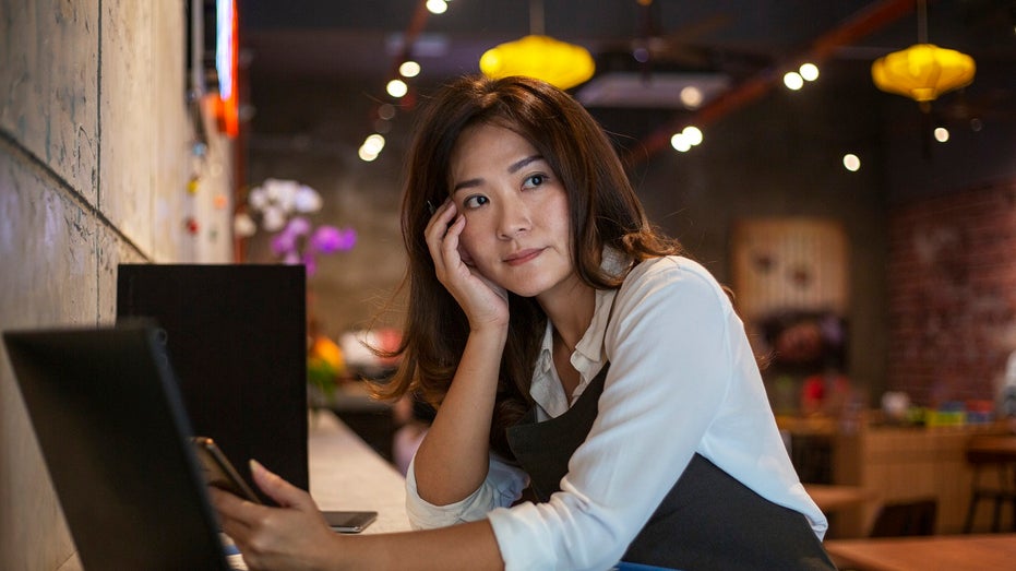 coffee shop owner stressed